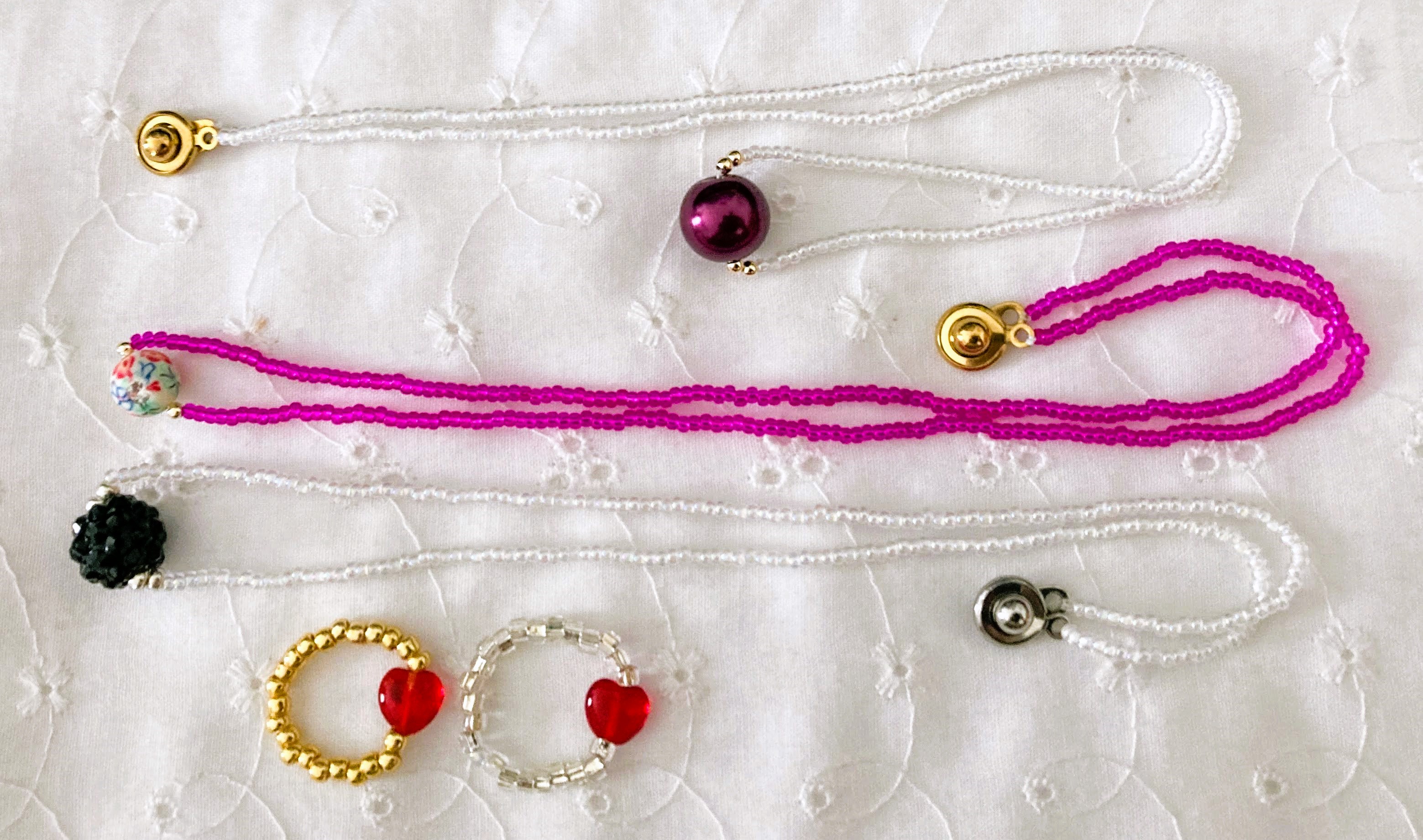 3 Choker Style Necklaces and 2 Stretch Rings. 